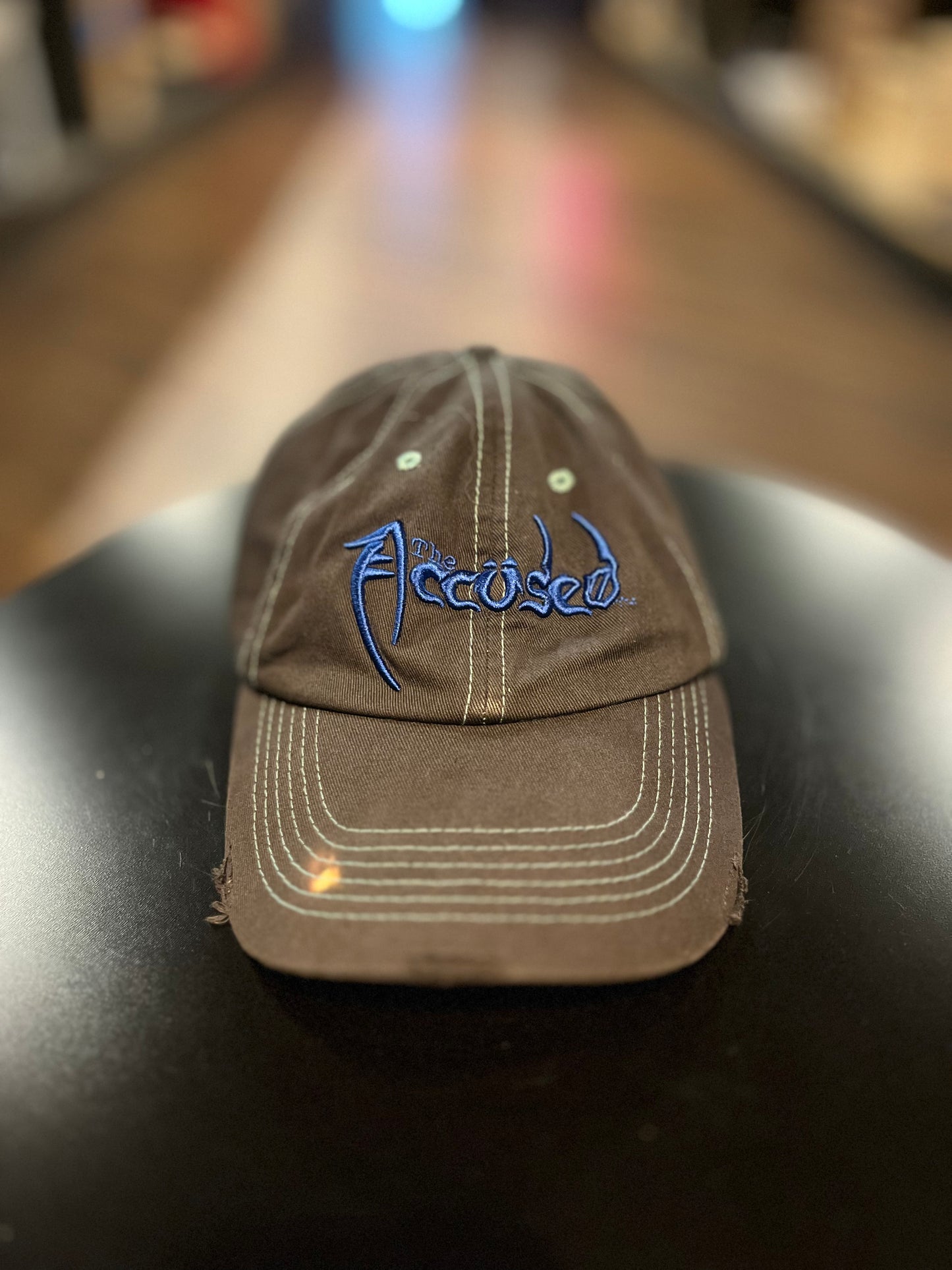 The Accüsed hat